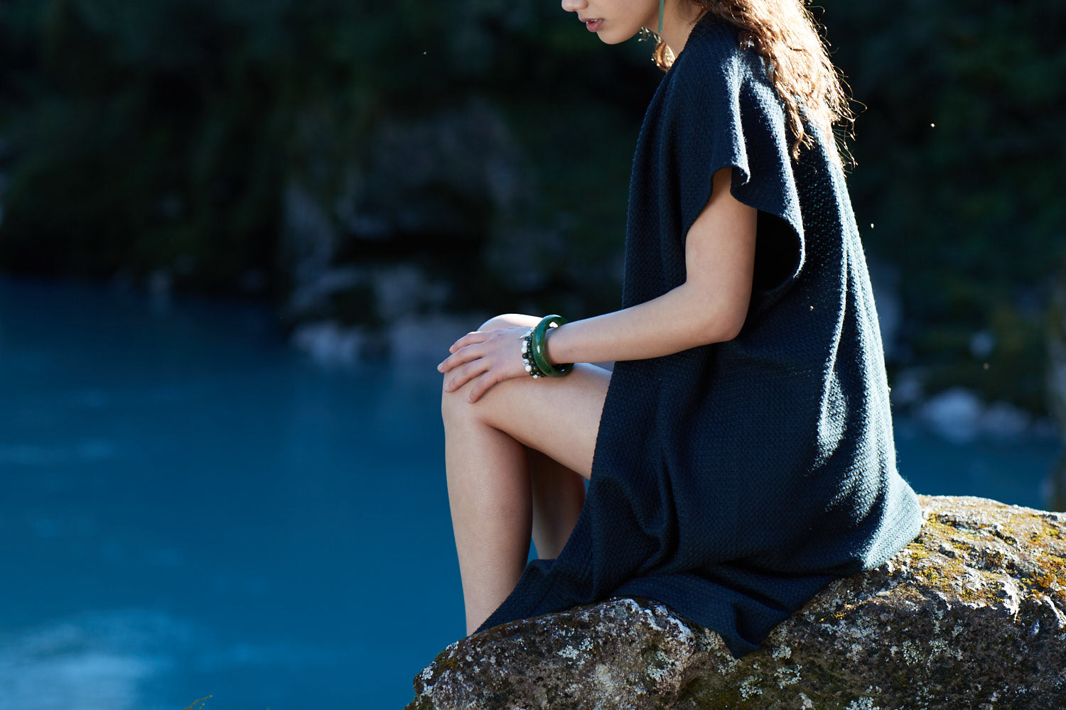 Girl wears bangle, South Island River New Zealand