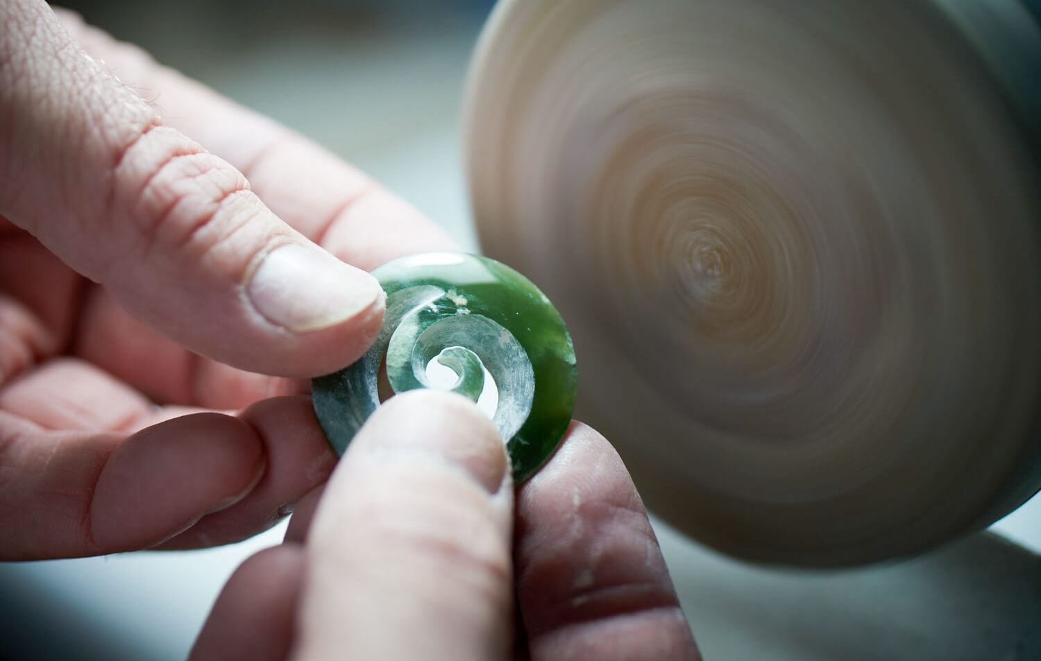 A closed koru during creation. All our pieces are hand carved.